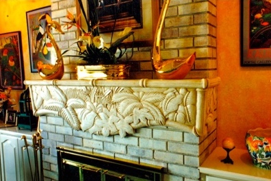 Carved tropical-leaf fireplace mantel